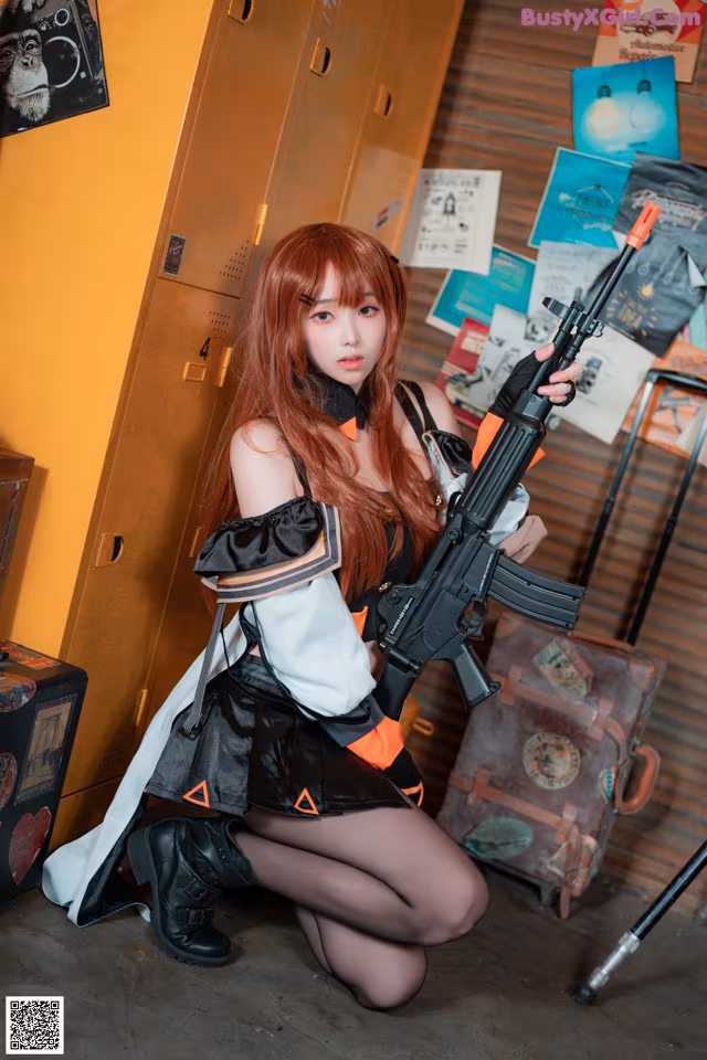 A woman in a black and white outfit holding a rifle.